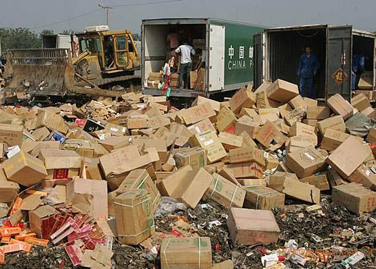 组图:北京烟草专卖局集中销毁2亿余支假烟_官